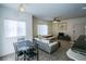 Open-concept living space with dining area and view of the living room at 4655 Gold Dust Ave # 206, Las Vegas, NV 89120