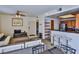 Open-concept living space flows seamlessly into the kitchen with breakfast bar seating at 4655 Gold Dust Ave # 206, Las Vegas, NV 89120