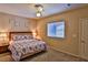 Comfortable main bedroom with a ceiling fan and neutral color scheme at 4655 Gold Dust Ave # 206, Las Vegas, NV 89120