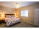 Comfortable main bedroom with a ceiling fan and neutral color scheme at 4655 Gold Dust Ave # 206, Las Vegas, NV 89120
