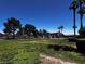 Scenic community park with lush green spaces and mature trees, creating a relaxing and inviting outdoor environment at 4730 E Craig Rd # 1148, Las Vegas, NV 89115