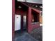 Exterior facade with textured wall, white front door, and visible apartment number at 4730 E Craig Rd # 1148, Las Vegas, NV 89115