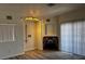 Inviting living room with wood flooring, a fireplace, and modern lighting at 4730 E Craig Rd # 1148, Las Vegas, NV 89115