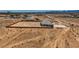 An aerial shot of a desert home features an expansive lot, perfect for privacy and potential development at 4740 W Agate Ave, Las Vegas, NV 89139