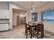 Charming breakfast nook offers a cozy dining space with a wooden table, comfortable chairs, and a window view at 4740 W Agate Ave, Las Vegas, NV 89139