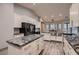 This modern kitchen features granite countertops, stainless steel appliances, and white cabinets, perfect for cooking at 4740 W Agate Ave, Las Vegas, NV 89139