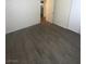 Bedroom featuring wood-look flooring and closet at 5115 Blossom Ave, Las Vegas, NV 89142