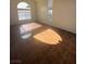 Living room with multiple windows, and tile flooring at 5115 Blossom Ave, Las Vegas, NV 89142