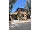 A view of the exterior elevation of the home with a two-car garage and well-kept landscape at 5280 Shreve Ave, Las Vegas, NV 89156