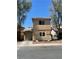A view of the exterior elevation of the home with an attached garage and landscaped yard at 5280 Shreve Ave, Las Vegas, NV 89156