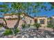 Single-story home featuring low maintenance landscaping and a two-car garage at 5280 Shreve Ave, Las Vegas, NV 89156