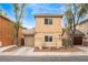 Two-story home featuring a stucco exterior, well-maintained landscaping, and a single-car garage at 5280 Shreve Ave, Las Vegas, NV 89156