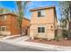 Charming home showcasing stucco architecture, a manicured front yard, and a private driveway at 5280 Shreve Ave, Las Vegas, NV 89156