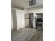 Modern kitchen with stainless steel appliances, granite countertops, and custom cabinets at 5280 Shreve Ave, Las Vegas, NV 89156