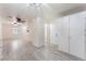 Open-concept living space with wood-look floors and storage solutions at 5280 Shreve Ave, Las Vegas, NV 89156