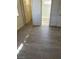 Spacious bedroom with wood-style flooring, closet, and a view into the bathroom at 5284 Wellesley Ave, Las Vegas, NV 89122