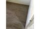 This bedroom features wood-look floors and access to the en-suite bathroom at 5284 Wellesley Ave, Las Vegas, NV 89122