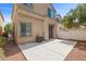 Backyard features a concrete patio, low-maintenance landscaping, and privacy fence at 5452 Tinker Toy Ave, Las Vegas, NV 89139