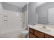 Bathroom with tile floor, bathtub and shower, and vanity at 5452 Tinker Toy Ave, Las Vegas, NV 89139