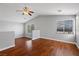 Bright bonus room featuring wood floors, a ceiling fan, and bright natural light at 5452 Tinker Toy Ave, Las Vegas, NV 89139