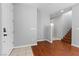 Welcoming foyer with neutral paint, hardwood floors, and staircase at 5452 Tinker Toy Ave, Las Vegas, NV 89139