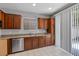 Kitchen featuring granite countertops, stainless steel appliances, and tile floors at 5452 Tinker Toy Ave, Las Vegas, NV 89139
