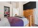 Bedroom with closet storage, a large TV on a dresser, and carpeted floors at 574 Desert Tortoise Way, Mesquite, NV 89027