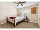 Cozy bedroom featuring neutral walls, carpeted flooring, and a decorative wrought iron bed frame at 574 Desert Tortoise Way, Mesquite, NV 89027