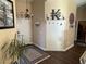 Inviting entryway with decorative accents, coat rack, and view into other rooms at 574 Desert Tortoise Way, Mesquite, NV 89027