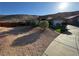 Desert front yard with low-water landscaping and desert plantings at 574 Desert Tortoise Way, Mesquite, NV 89027