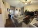 Cozy living room with vaulted ceilings, comfortable seating, and ceiling fan at 574 Desert Tortoise Way, Mesquite, NV 89027