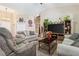 Cozy living room with a decorative entertainment center, comfortable seating, and an open layout at 574 Desert Tortoise Way, Mesquite, NV 89027