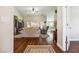 Spacious living room boasts hardwood floors, bright windows, and neutral toned furniture at 574 Desert Tortoise Way, Mesquite, NV 89027