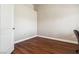 Empty room with hardwood floors, white walls, and white door at 574 Desert Tortoise Way, Mesquite, NV 89027