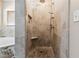 Tiled walk-in shower featuring a rainfall showerhead and built-in niche at 574 Desert Tortoise Way, Mesquite, NV 89027