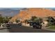 This neighborhood street has mountain views and well-maintained homes with desert landscaping at 574 Desert Tortoise Way, Mesquite, NV 89027