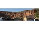 Street view featuring desert mountain backdrop and well-maintained homes at 574 Desert Tortoise Way, Mesquite, NV 89027