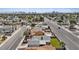 Aerial view showcasing the neighborhood, nearby street, and proximity to the iconic Las Vegas skyline at 6553 Baywood Ave, Las Vegas, NV 89103