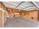 Spacious two-car garage featuring ample storage cabinets and workbench at 6553 Baywood Ave, Las Vegas, NV 89103