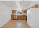 Functional kitchen with stainless steel sink and appliances, and light wood cabinets at 6553 Baywood Ave, Las Vegas, NV 89103