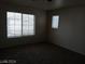 This room provides great natural lighting and comfortable carpet at 70 Belle Essence Ave, Las Vegas, NV 89123