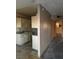 Kitchen with cabinetry, countertop, and sink, with a view into the next room at 709 G St, Las Vegas, NV 89106