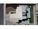 An aerial view of the home shows the well maintained tiled roof, back yard and surrounding neighborhood at 7197 Sixshooter Dr, Las Vegas, NV 89119