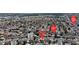 Aerial view showing proximity to Warm Springs Road and Tamarus Street in a suburban neighborhood at 7197 Sixshooter Dr, Las Vegas, NV 89119