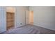 Bedroom view featuring a closet and open doorway to another room at 7517 Crested Moon St, North Las Vegas, NV 89084