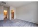 A view of a bedroom, closet, and ensuite bathroom at 7517 Crested Moon St, North Las Vegas, NV 89084