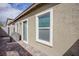 A view of the exterior of the home with patio at 7517 Crested Moon St, North Las Vegas, NV 89084