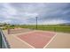 Well-maintained pickleball court, ideal for friendly matches and outdoor recreation within the community park at 7517 Crested Moon St, North Las Vegas, NV 89084