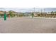 A well-maintained sand volleyball court, ideal for friendly games and outdoor recreation within the community park at 7517 Crested Moon St, North Las Vegas, NV 89084