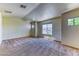 Bright bedroom with large windows, neutral tones, and a comfortable layout at 7900 Dutch Canyon Ct, Las Vegas, NV 89131